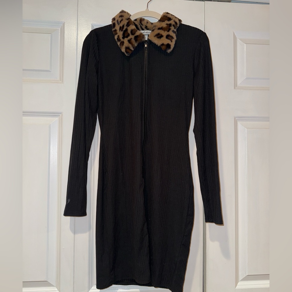 Black dress with zipper down the middle and cheetah collar detail